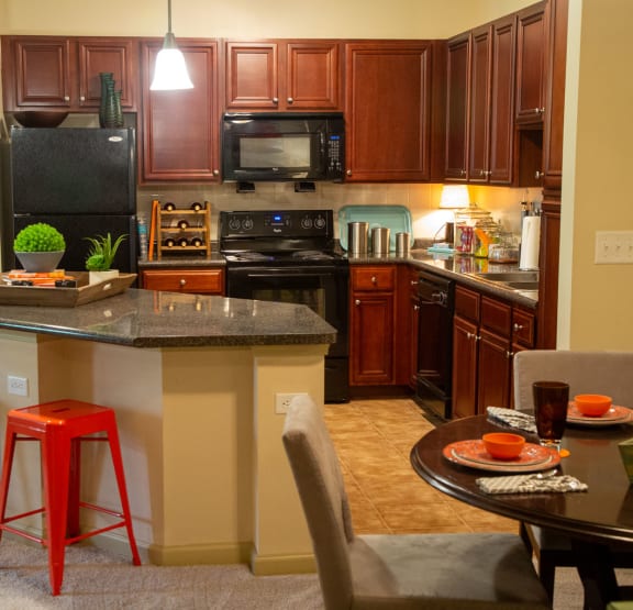 this is a photo of the kitchen and living room in a 1 bedroom apartment at deer hill