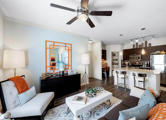 Living room and kitchen at Atley on the Greenway Apartments in Ashburn VA