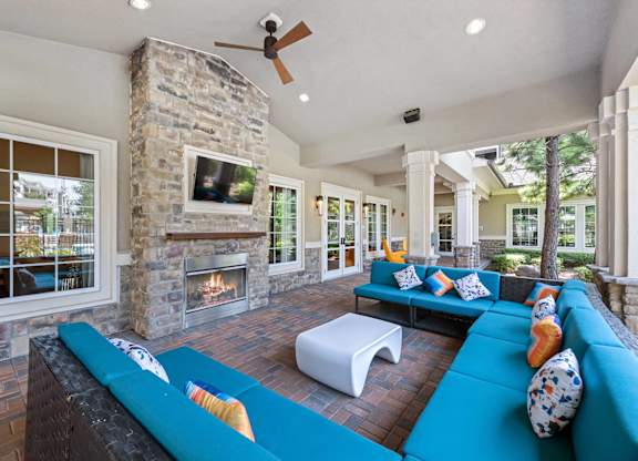 Outdoor fireside lounge at Atley on the Greenway Apartments in Ashburn VA