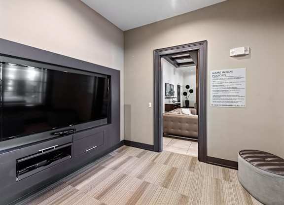 Social lounge game room at Atley on the Greenway Apartments in Ashburn VA