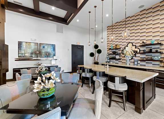 Social lounge kitchen and dining at Atley on the Greenway Apartments in Ashburn VA
