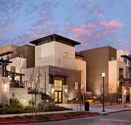 a rendering of a building with a street in front of it
