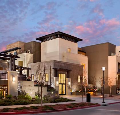 A modern building with a sign that says "Parker House" in front of it.
