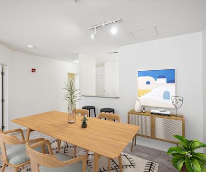 a dining room with a wooden table and chairs at Highlands at Faxon Woods, Quincy, Massachusetts