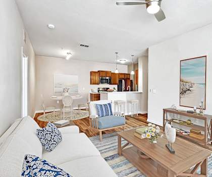 a living room with a couch and a table at Grandeville on Saxon, Orange City, Florida