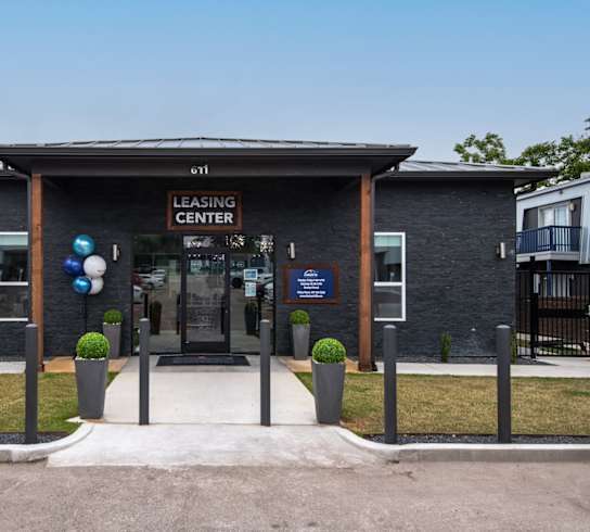 Stadium 700 leasing center is located in the front of the building