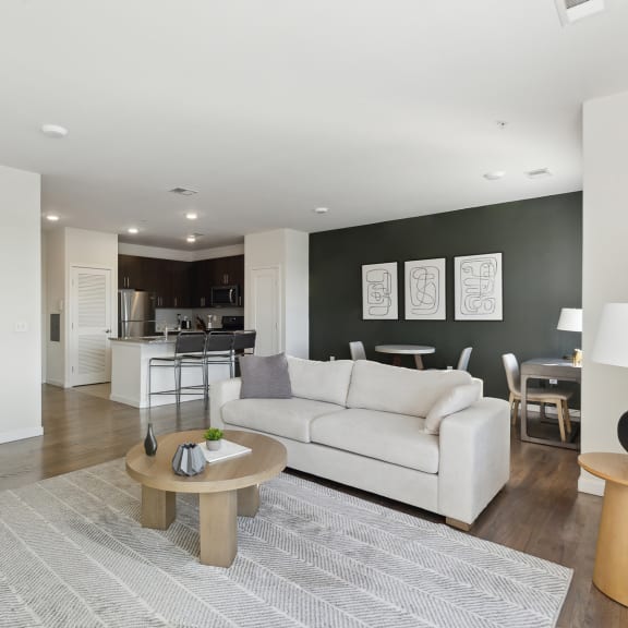 a living room with a couch and a table