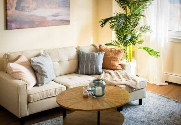 a living room with a couch and a coffee table