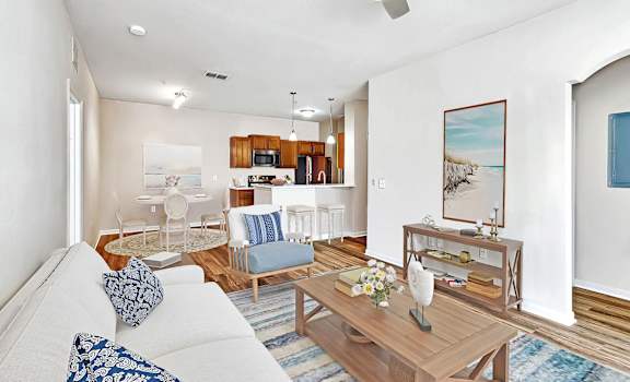 a living room with a couch and a table at Grandeville on Saxon, Orange City, Florida