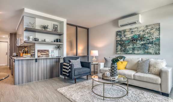 a living room with a couch and a coffee table