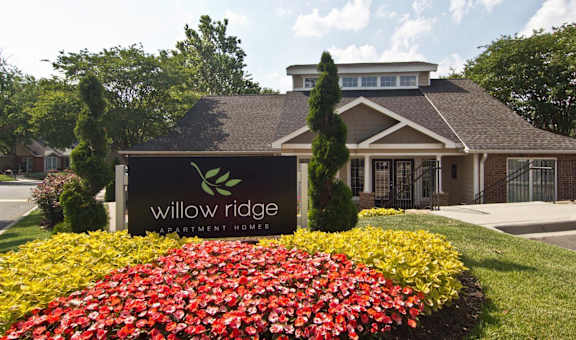 our sign in front of our building in the fall