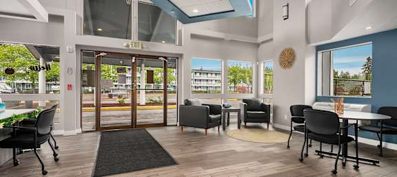 A modern office space with blue and white accents.