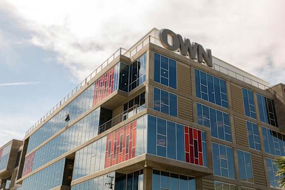 A building with the word "OWN" on top of it.