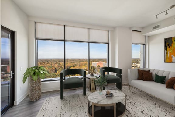 an open living room with a view of the city at The Sutton, Georgia