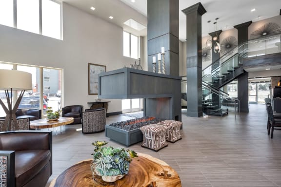 Westwood Green Apartments Clubhouse faux wood floors, fireplace and high ceilings