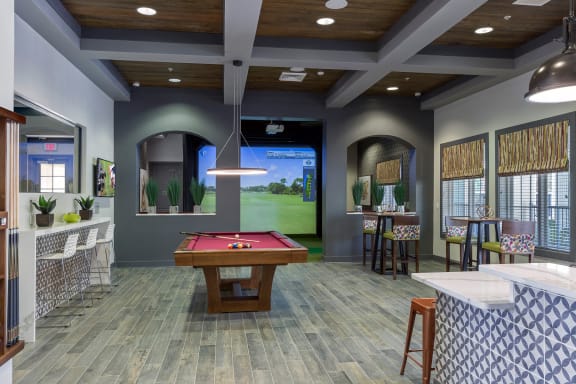 Clubhouse game room at Integra 360 Apartments, Winter Springs, 32708