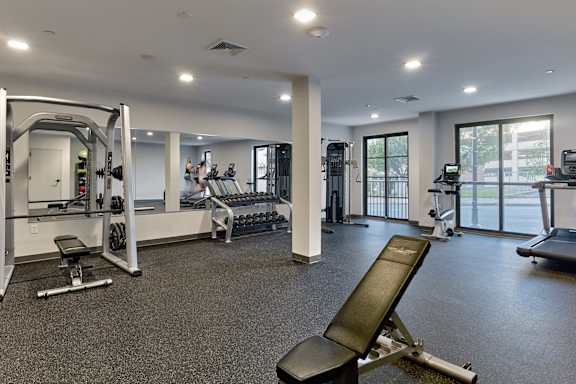 Gym with weights and cardio equipment with glass doors at Walnut Street Commons, Allentown, PA, Pennsylvania, 18101