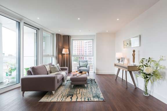 a living room with a couch and a chair