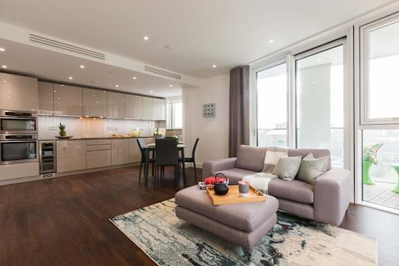 a living room with a couch and a table