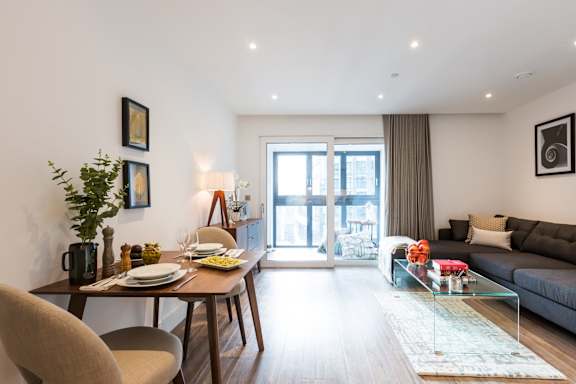 a living room with a couch and a table
