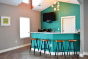 Thumbnail 19 of 22 - Clubhouse kitchen with counter height bar stool seating