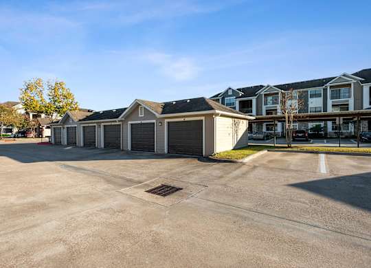 Exterior Garages at Lakeland Estates Apartments in Stafford TX