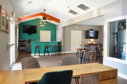 Clubhouse and leasing office with kitchen and counter top seating