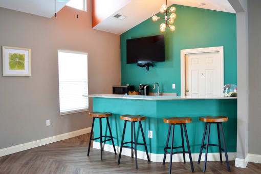 Clubhouse kitchen with counter height bar stool seating
