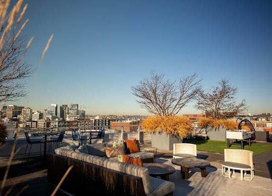 Rooftop deck with seating at Infinity Apartments in Seattle WA