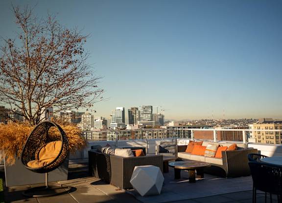 Rooftop deck with city view at Infinity Apartments in Seattle WA