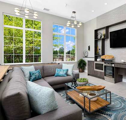 a living room with a couch and a table
