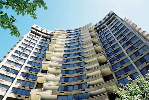 A tall building with many windows and balconies at Hampton Plaza Apartments, Towson, MD, 21286