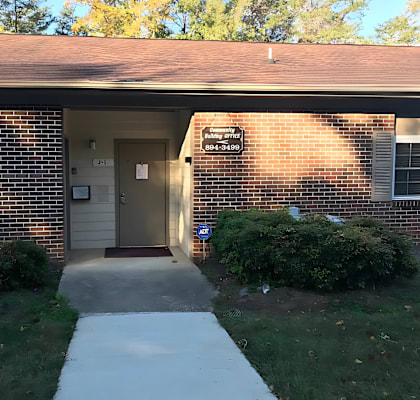 A brick building with a sign that says "Bank of America" on it.