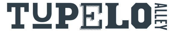 The image shows the word "TUPERLOY" in large, bold letters with a shadow effect.