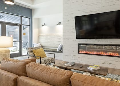Clubhouse seating by fireplace at FARM BY VINTAGE, Washington, 98012