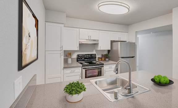 a kitchen with white cabinetry and stainless steel appliances at 2300 West Apartments, Nevada, 89502