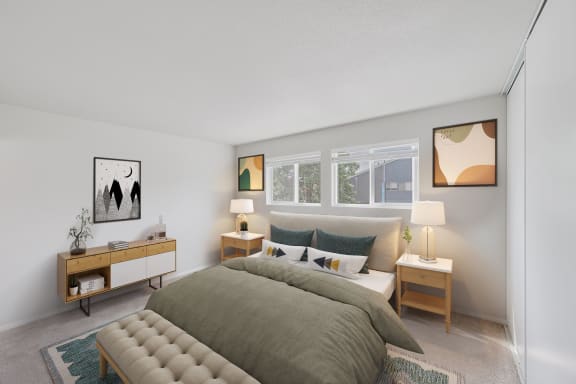 a bedroom with a large bed in front of a window at 2300 West Apartments, Nevada, 89502
