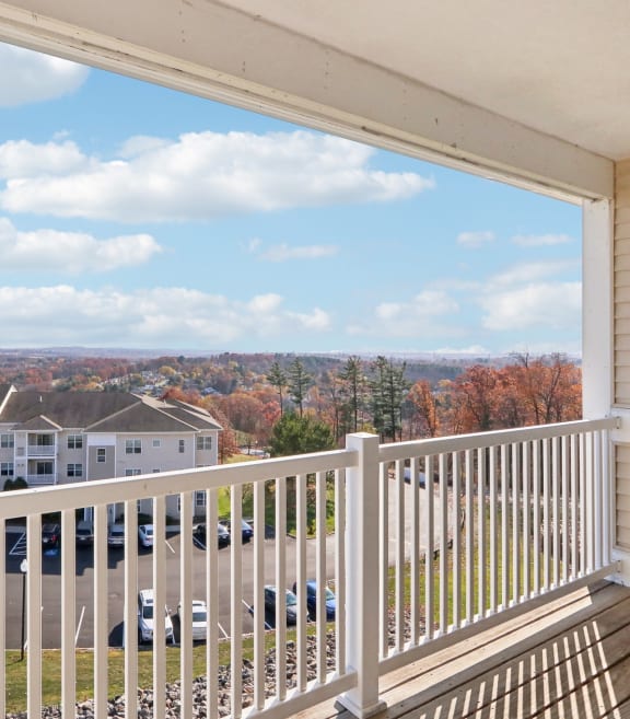the view from the balcony of an apartment building overlooking the city