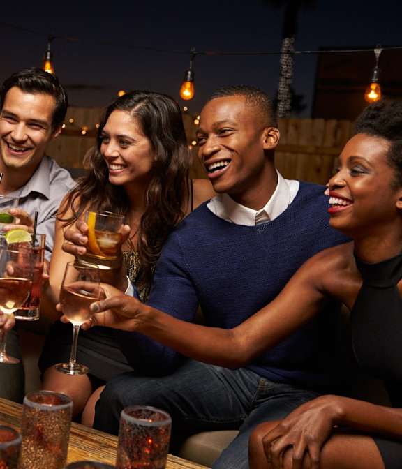 Group of Friends Toasting with Drinks