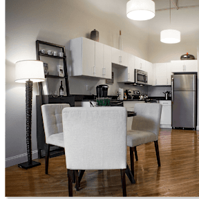 Open concept kitchen and dining area at Star Mill Lofts Apartments, Middleboro, MA 02370
