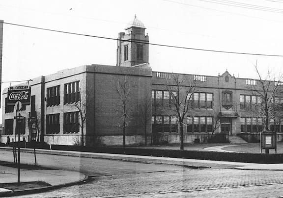 a black and white photo of a brick building