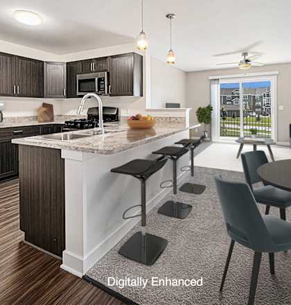 A modern kitchen with a dining table set for four.