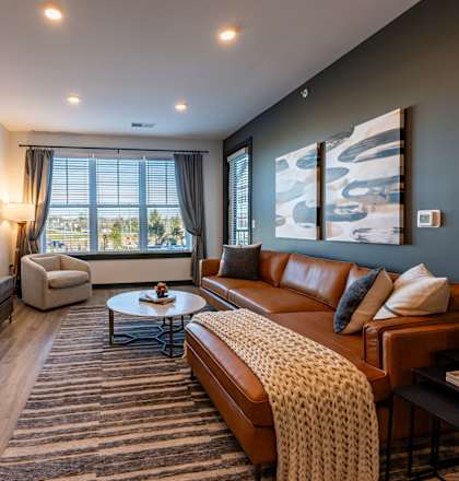 a living room with a couch and a tv