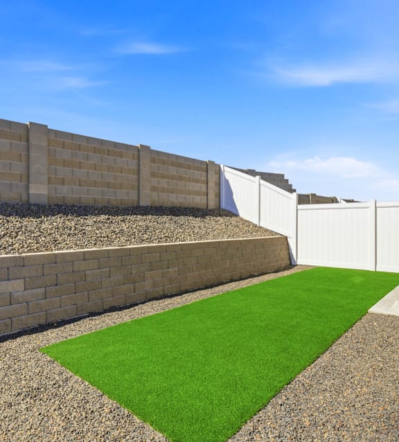 A wall made of bricks and a wall made of concrete blocks.