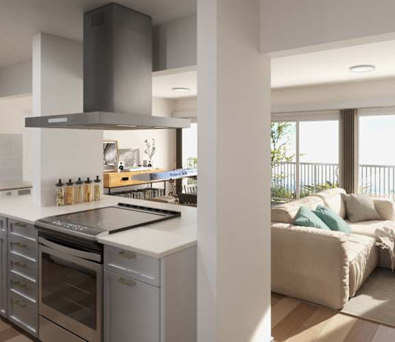 a living room with a kitchen and a couch at Ocean Edge @ Laguna Beach Apartments, California