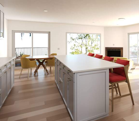 a kitchen and living room with a table and chair at Ocean Edge @ Laguna Beach Apartments, Laguna Beach, California