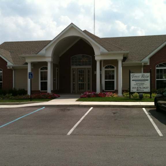 A building with a sign that says Forest Ridge on it.