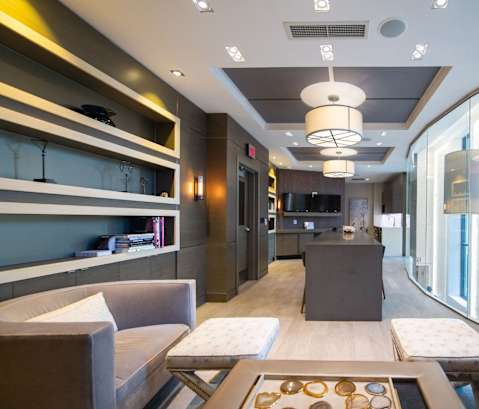 a living room and kitchen in a hotel room