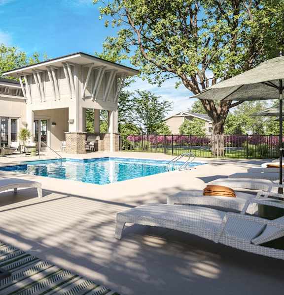 A modern house with a pool in the backyard.