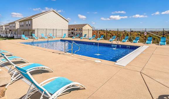 our apartments have a large pool and lounge chairs